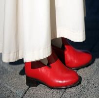 A história dos sapatos vermelhos do Papa